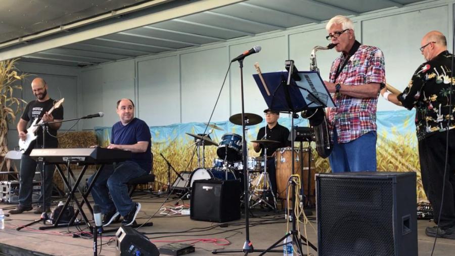 Sal playing keyboard with band at Unionville