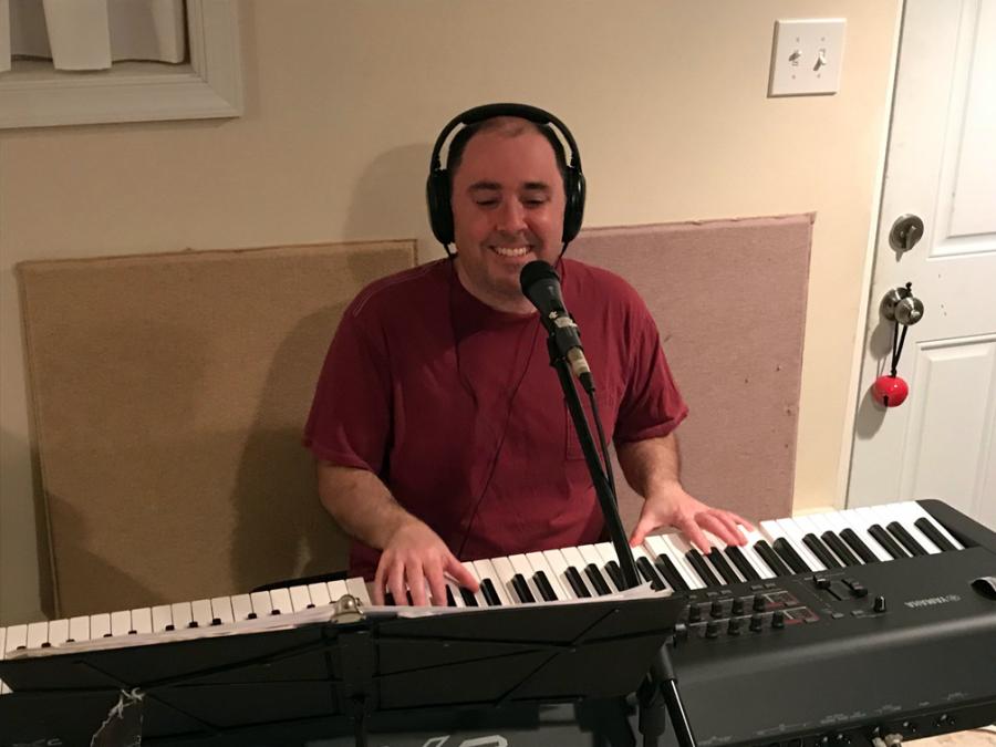 Sal recording keyboard in studio