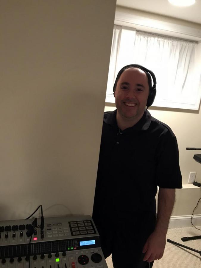 Sal listening to band recording